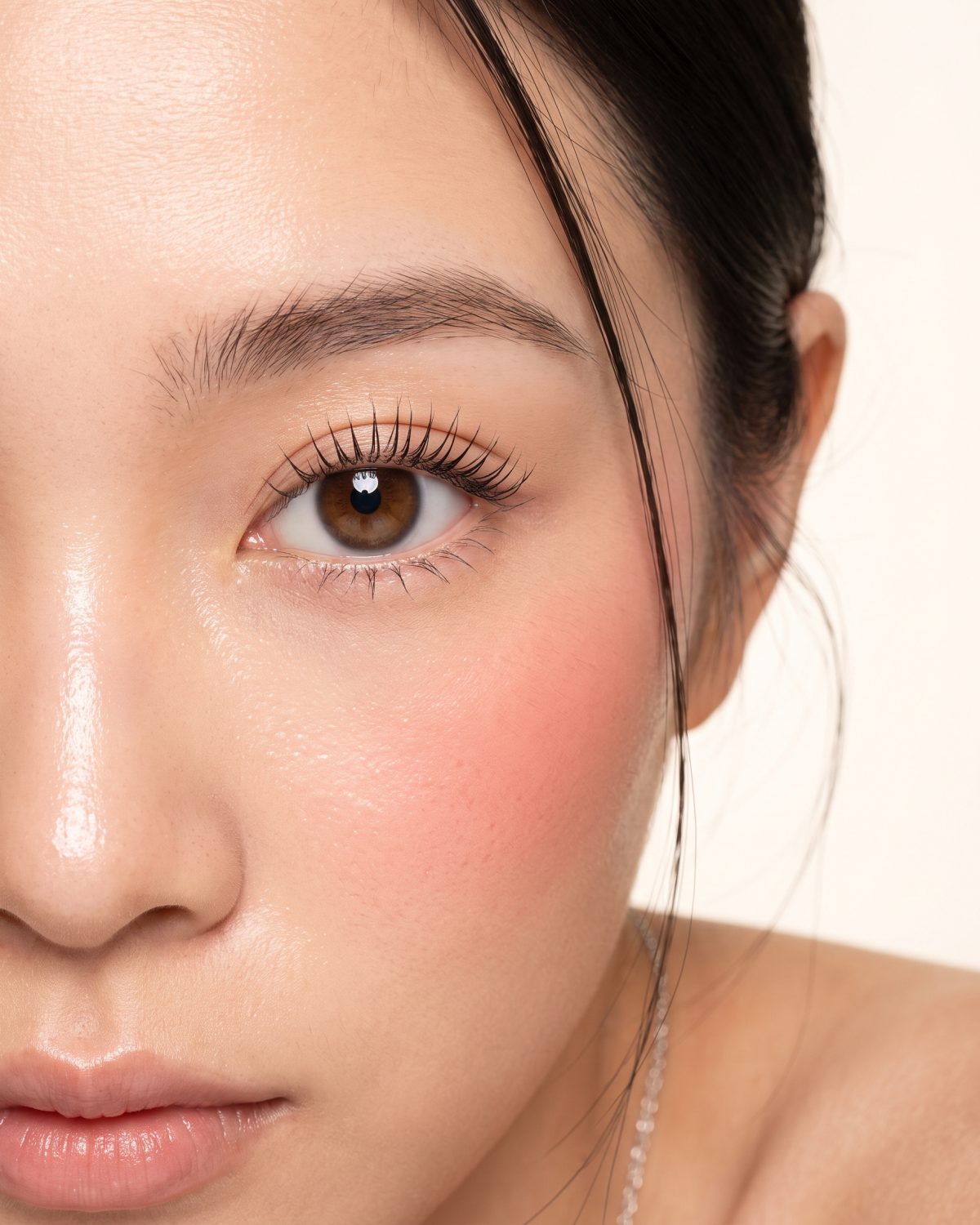 Close-up of one eye and brow after a Barbie Perm, lashes lifted from the root.